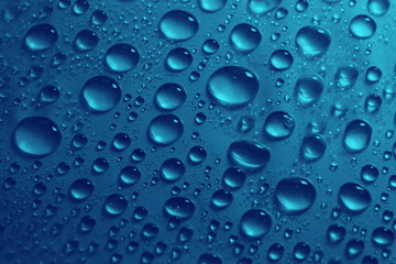 Canvas Print - water drops on blue background texture