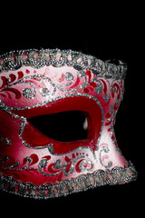 Wall Mural - Venetian Masquerade Red and Silver Ball Mask on Black Background