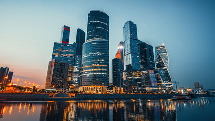 Wall Mural - Panoramic view of Moscow city and Moskva River after sunset. New modern futuristic skyscrapers of Moscow-City - International Business Center