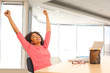 © Mark Adams - Happy millennial black businnesswoman finished with work on laptop computer