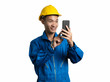 © Phushutter - Headshot of engineer young man using mobile phone Asian man.