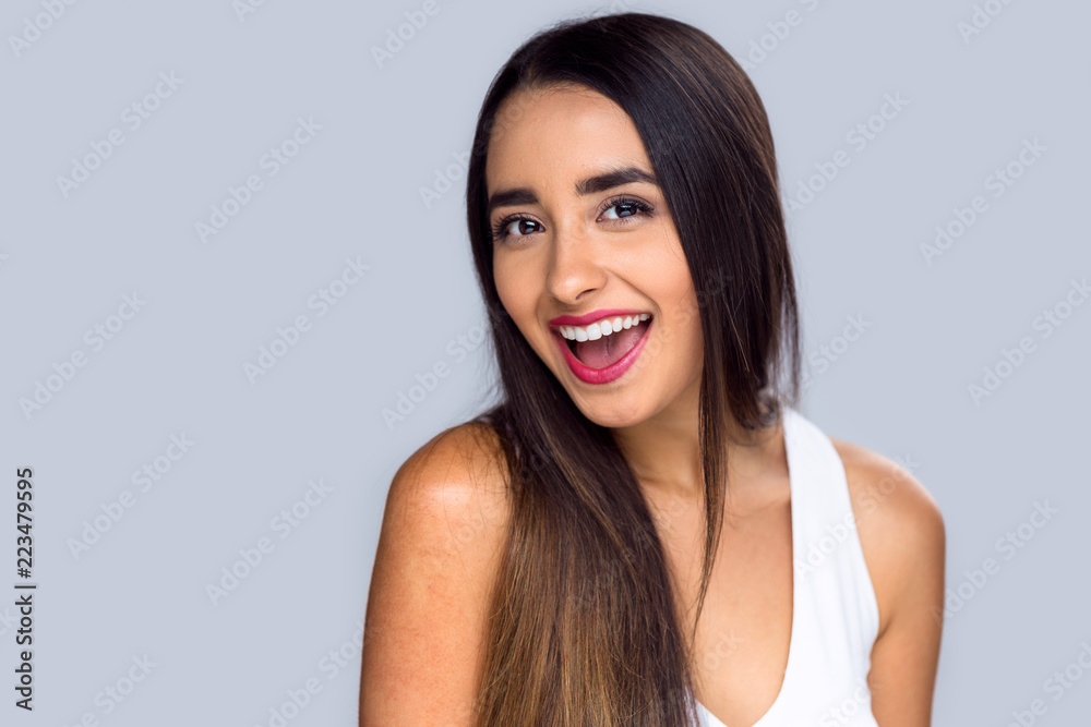 Beautiful hispanic girl proud and confident about her perfect white teeth smile - obrazy, fototapety, plakaty 