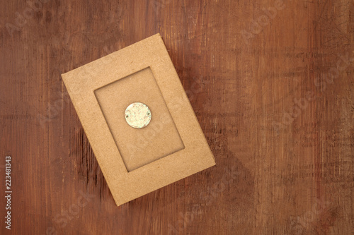 Fotografering An overhead photo of a mysterious box on a dark rustic background with copy spac