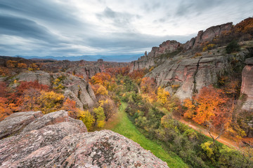Wall Mural - magnificent morning view of the belogradchik rocks in bulgaria, lit by the autumn sun