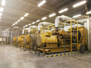 A very large electric diesel generator in factory for emergency,equipment plant modern technology industrial