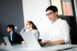 © NDABCREATIVITY - Corporate business team and manager in a meeting