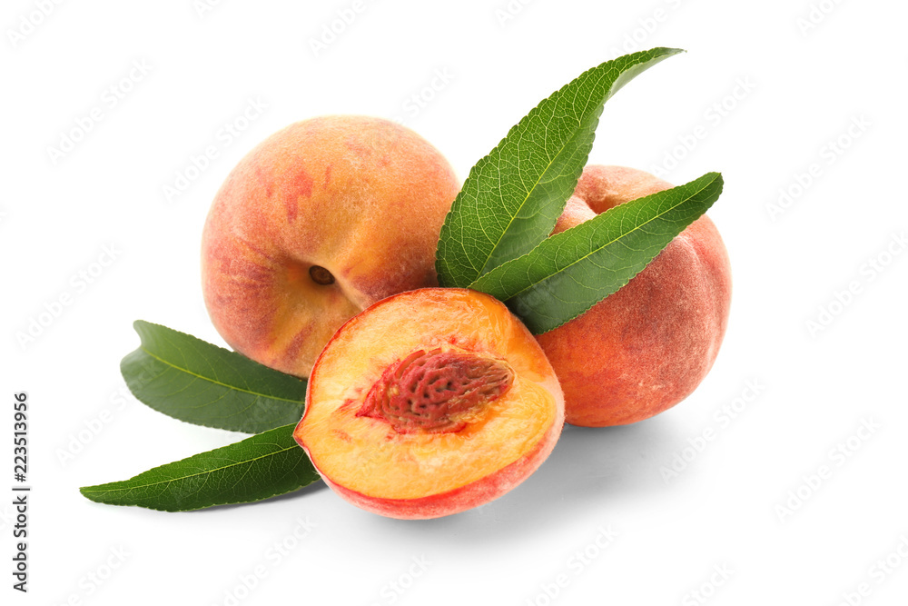 Fresh peaches on white background