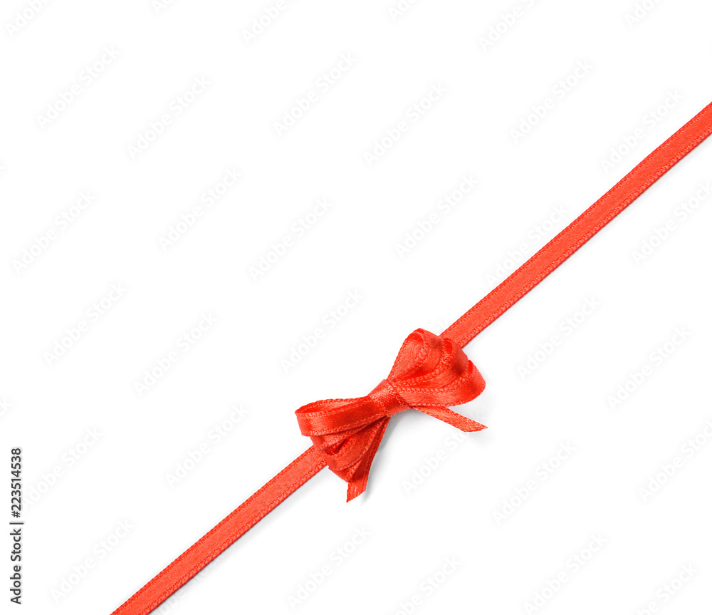 Red ribbon with bow on white background