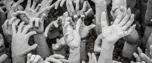 Sculpture Of Hundreds Outreaching Hands.  White Temple, Chiang Rai Thailand