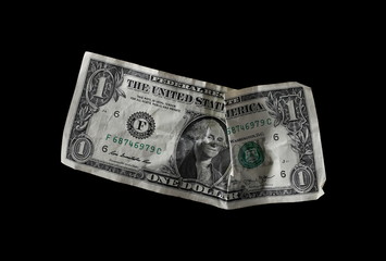 One dollar bill isolated on black background