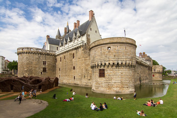 Wall Mural - People visiting The Château des ducs de Bretagne (Castle of the Dukes of Brittany) in summer in the city of Nantes, France, on July 29, 2014
