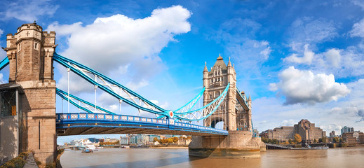 Wall Mural - Tower Bridge in London, England, on a bright sunny day under gorgeous sky with clouds