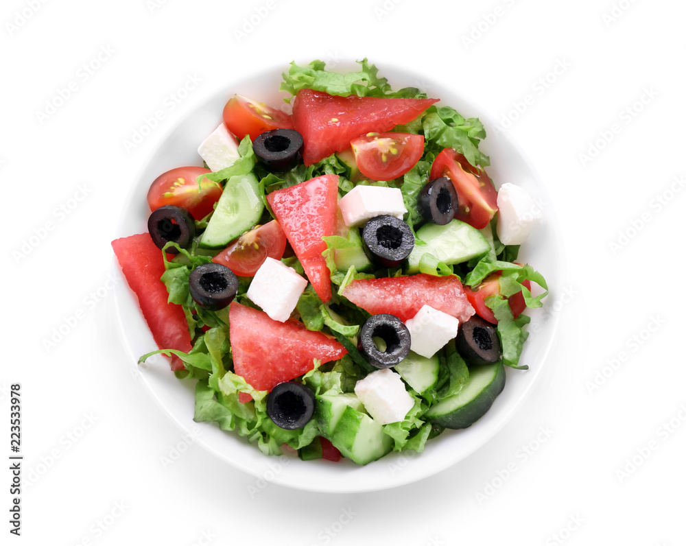 Bowl with delicious watermelon salad on white background