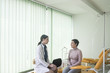 © LStockStudio - A Woman Physician Talking With Her Patient