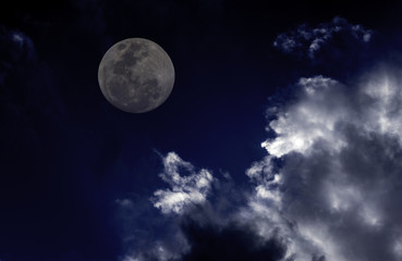 Naklejka na meble Attractive photo of super moon background night sky with cloudy and bright full moon.  The moon were NOT furnished by NASA.