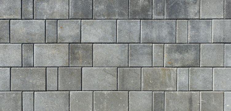 concrete or cobble gray pavement slabs or stones for floor, wall or path.