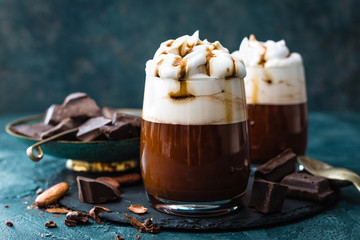 Wall Mural - Hot chocolate with whipped cream. Chocolate dessert drink in glass