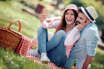 Sticker - Couple take selfie on picnic