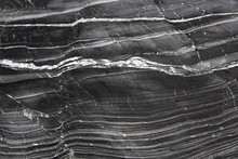A Textured Background Image Of The Layers Of Slate And Marble That Have Been Compressed Together Over Millions Of Years In The Cross Section Of A Geological Rock Formation