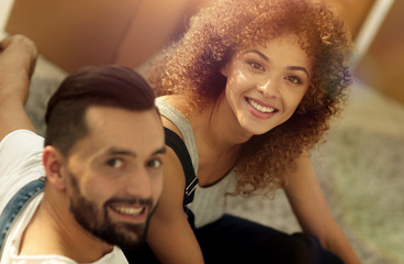 Happy young couple in a new apartment.