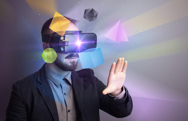 Poster - Amazed businessman with virtual reality colorful geometric shapes in front of him
