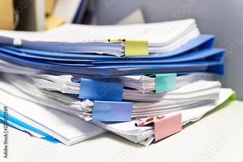 Fotografie, Obraz file folder and Stack of business report paper file on the table in a work offic
