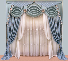 Decoration of the interior of the living room in the classical, palace style. Curtains of dense fabric with blue ornaments, lambrequin, pelmet, jabot, and tulle with embroidery
