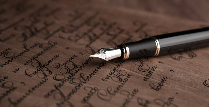 fountain pen on letter with text vintage