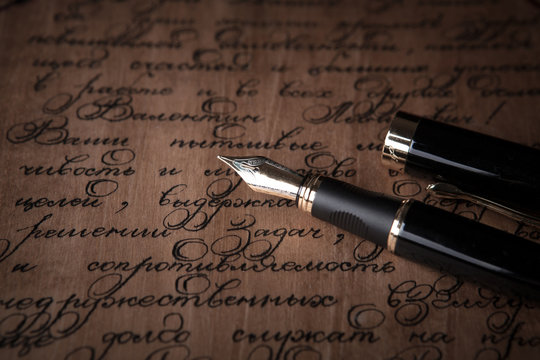 fountain pen on letter with text vintage