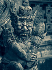 Traditional stone statues depicting demons in Bali,Indonesia