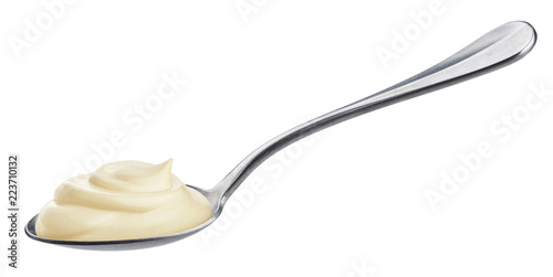 Fotografía Sour cream in spoon isolated on white background