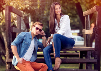 Young couple together in autumn park