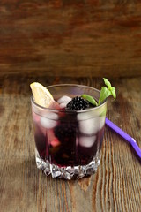 Wall Mural - Cocktail with blackberry, lemon and mint, vertical