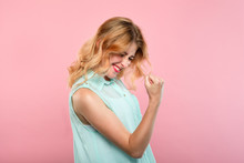 Yes Success And Achievement. Happy Joyful Smiling Girl Making A Win Gesture. Excited Thrilled Woman Portrait On Pink Background.
