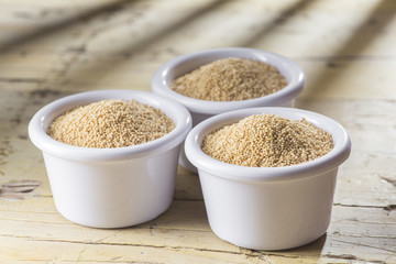 Wall Mural - amaranth beans in bowl, on rustic wooden background