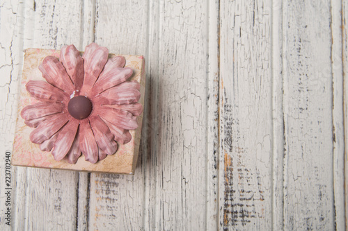 Fotografie, Obraz Decorated gift box on painted wood background