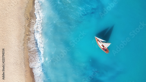 Yacht on the water surface ...