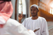 © FS-Stock - Muslim men praying with holy books in mosque
