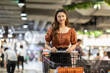 Beautiful Attractive Asian Woman Smile With Shopping Cart In Supermarket Feeling So Happiness And Enjoy,Shopping Concept