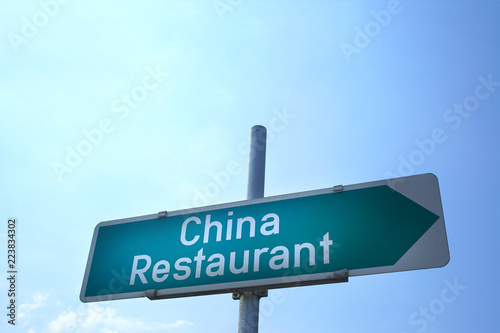 Foto china restaurant sign, blue sky background