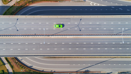 Wall Mural - Car on Highway road network intersection for traffic or transportation concept.