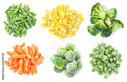Fotografia  Set with frozen vegetables on white background, top view