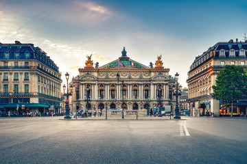 French Opera in Paris, France.  Scenic skyline against sunset sky. Travel background.