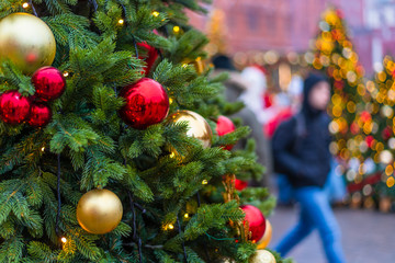 Christmas tree with decorations on the streets of the city close-up