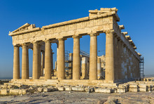The Parthenon On The Athenian Acropolis With Blue Sky In The Background
