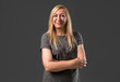© luismolinero - Middle age blonde woman on grey background