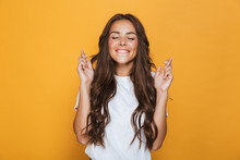 Portrait Of A Happy Young Girl With Long Brunette Hair