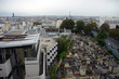 City and roof of Paris with the Montmartre Cemetery