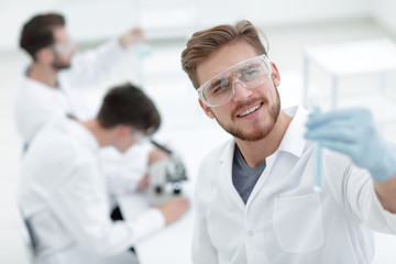 Wall Mural - closeup. scientist with beaker