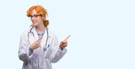 Canvas Print - Young redhead woman wearing doctor uniform smiling and looking at the camera pointing with two hands and fingers to the side.